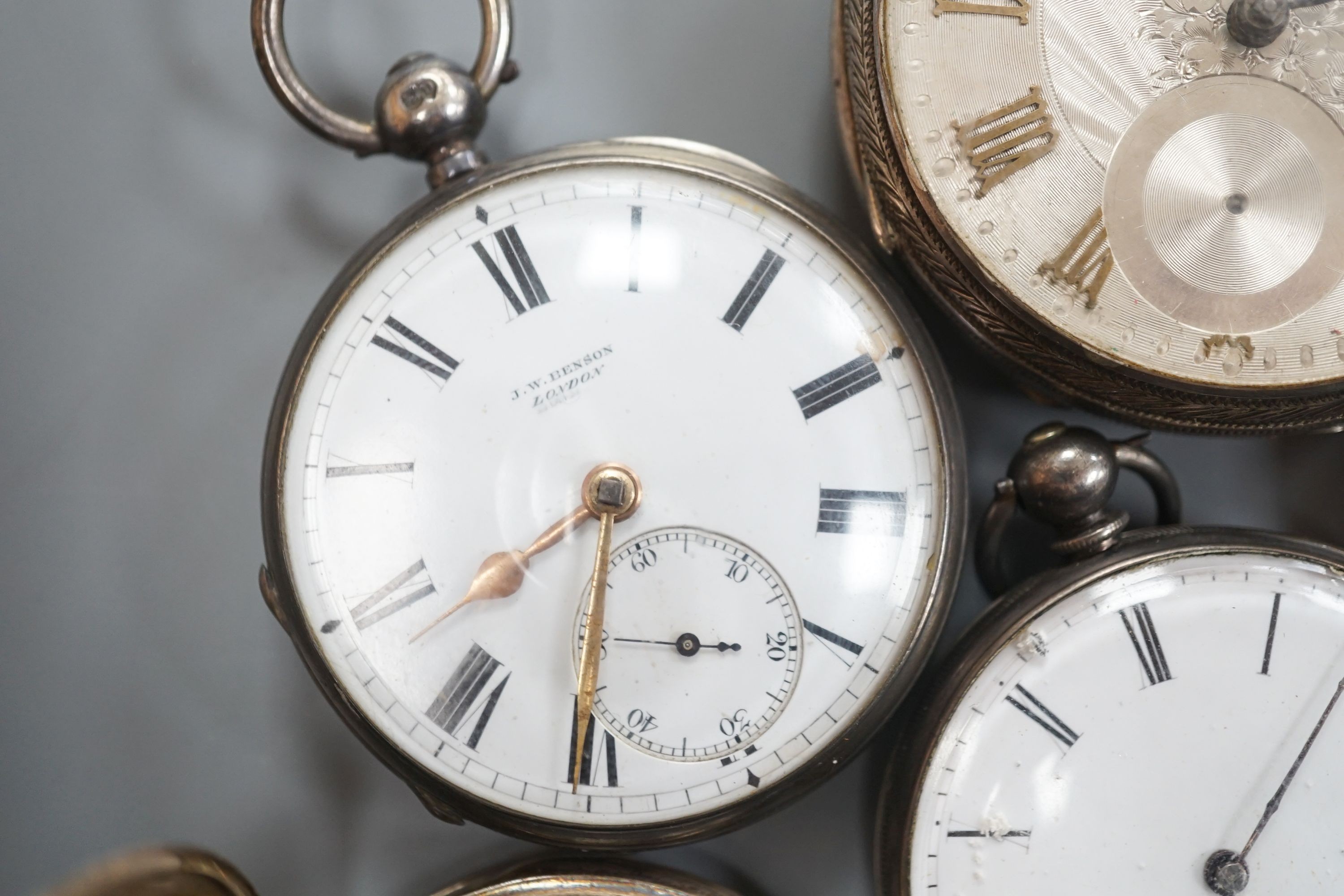 Six assorted late Victorian and later silver or white metal pocket watches, including J.W. Benson.